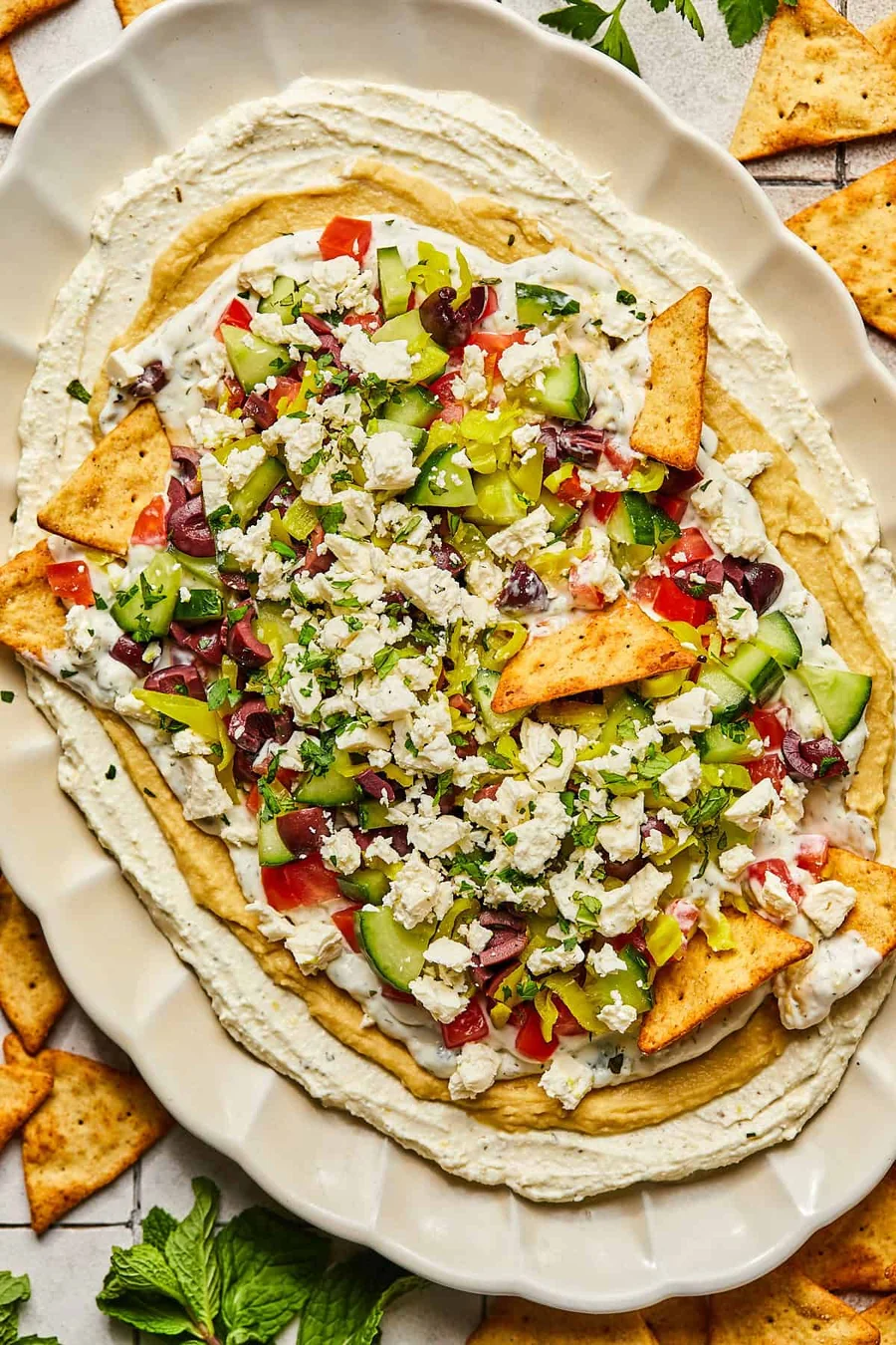 Fresh layered dip and salad for midday lunch