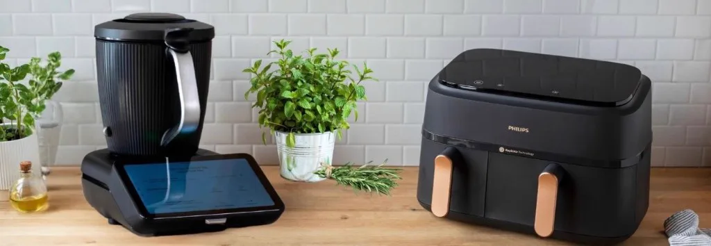 Thermomix and an air fryer side by side on a kitchen worktop